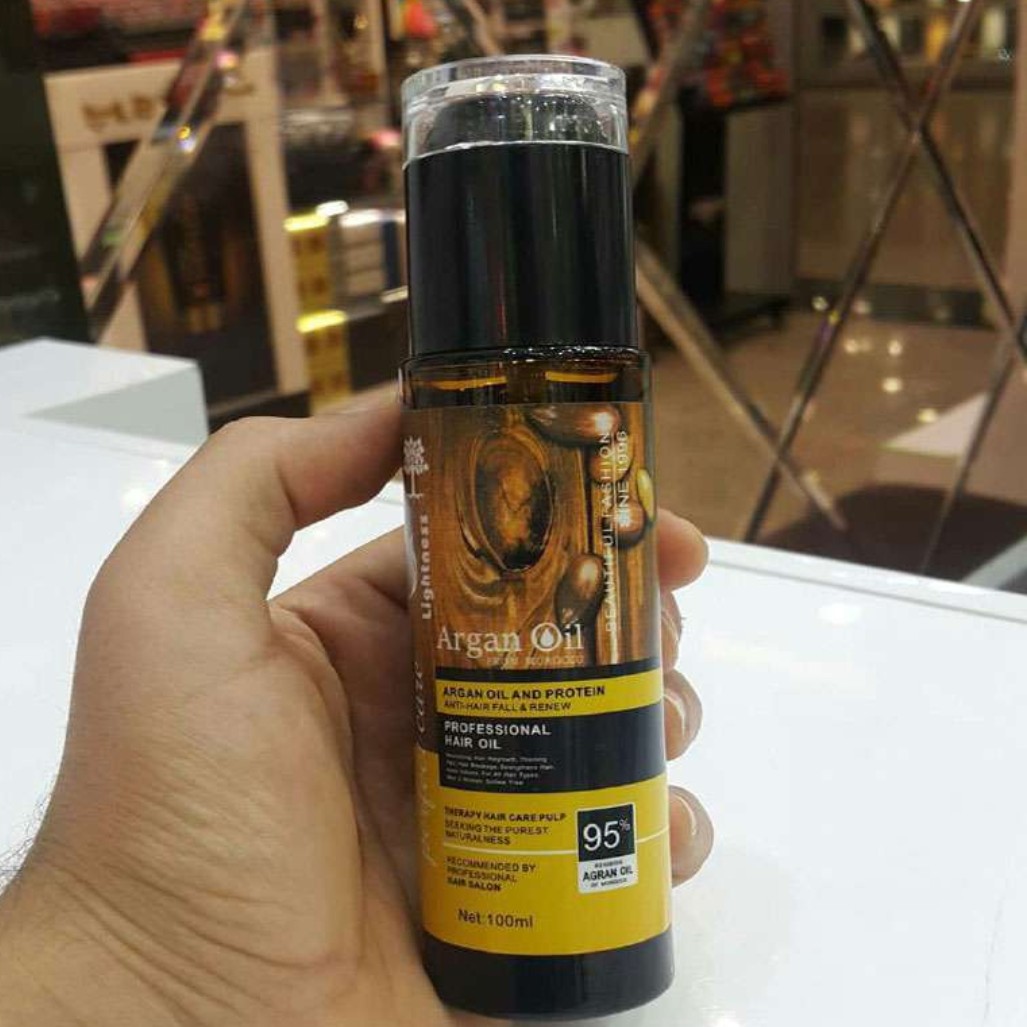 روغن آرگان خالص اصل lightness argan oil حجم 100 میل روغن ارگان لایت نس سرم آبرسان مو تقویت موی دکلره شده روغن ضد موخوره