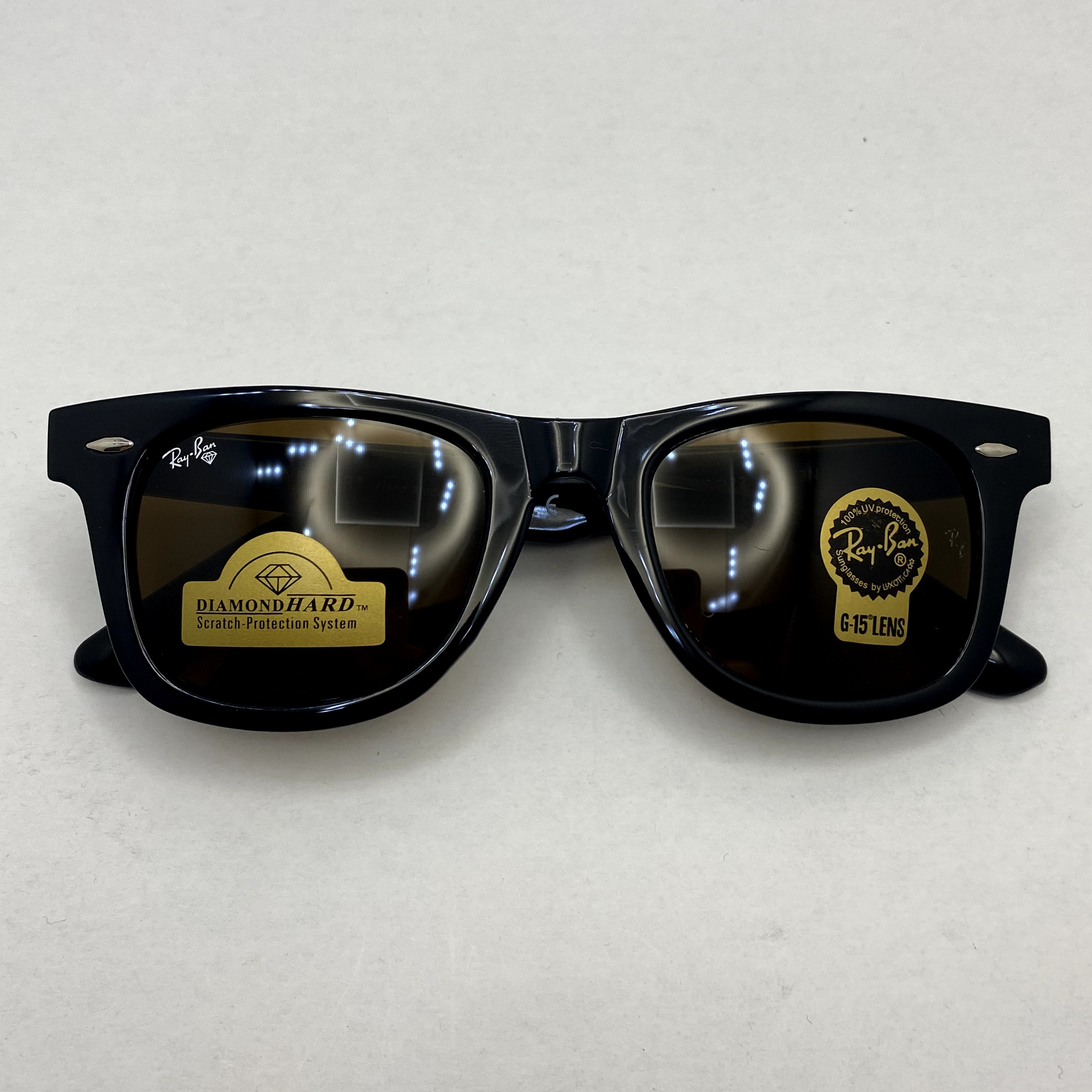عینک آفتابی ویفرر ریبن rayban WAYFARER شیشه سنگ قهوه ای فریم براق سایز 50 به همراه پک کامل اورجینال RB2140